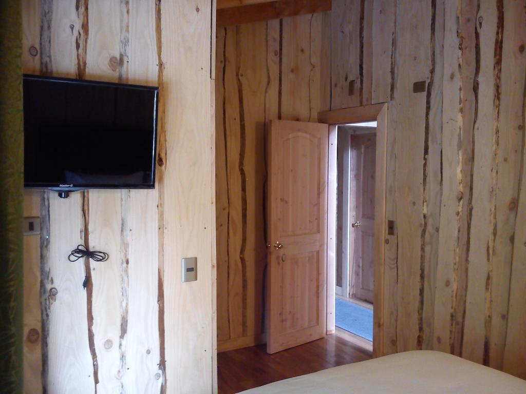 Hostal Los Alamos Neltume Ruang foto