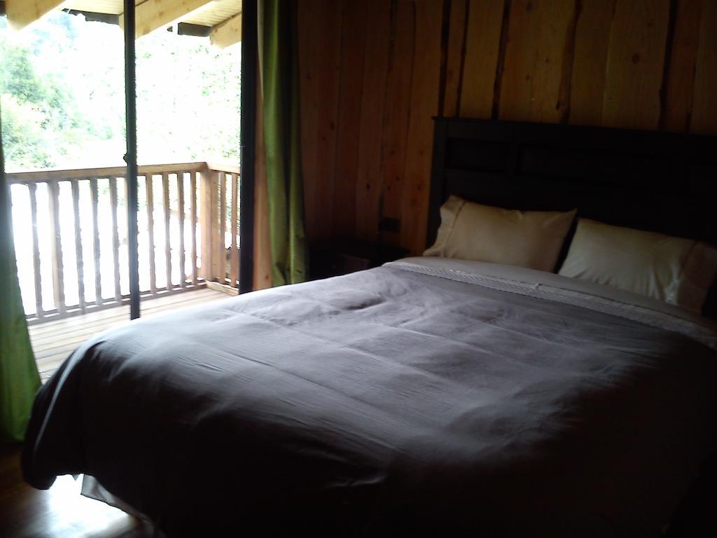 Hostal Los Alamos Neltume Ruang foto